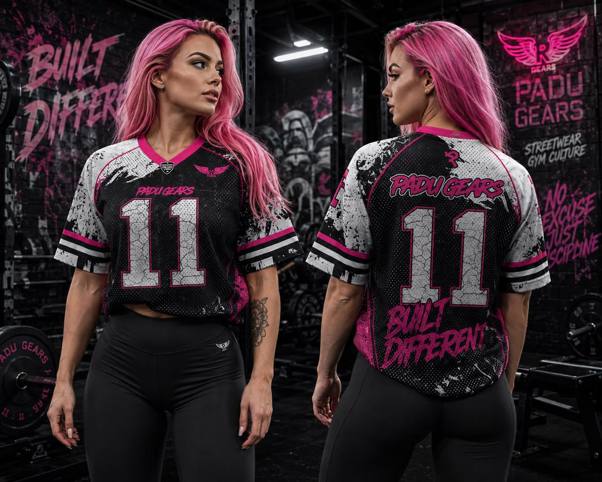 Front and back views of a model wearing the Built Different pink oversized jersey